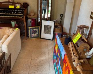 Working 1960 Hammond Organ, spinning wheel, weaving and spinning tools, baskets of yarn, artwork, vintage 1980s sofa bed, curio cabinet