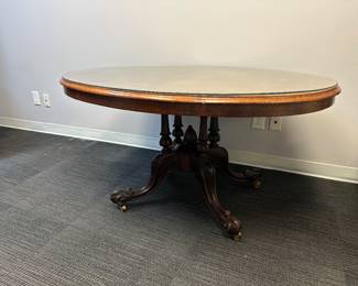 Tilt top inlay oval pedestal table with plate glass protective top