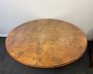 Tilt top inlay oval pedestal table with plate glass protective top