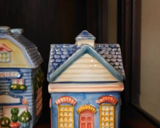 vintage Avon Spice Cottage Jars, collectible ceramic containers shaped like different houses.