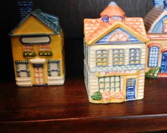 vintage Avon Spice Cottage Jars, collectible ceramic containers shaped like different houses.