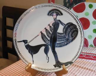 Franklin Mint for House of Erte "Symphony in Black" porcelain collector's plate featuring a striking Art Deco design of a woman walking a black dog