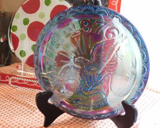 Indiana Glass Company blue iridescent carnival glass plate commemorating the United States Bicentennial with a design featuring a raised relief eagle and the dates 1776–1976.