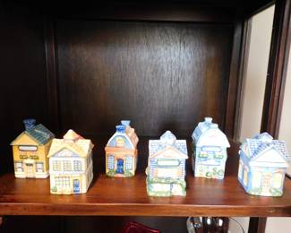 Vintage Avon Spice Cottage Jars, collectible ceramic containers shaped like different houses.