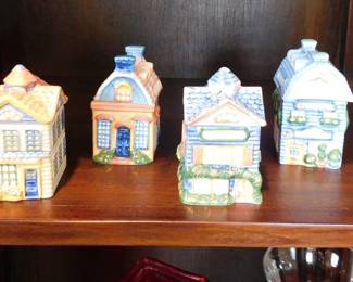 Vintage Avon Spice Cottage Jars, collectible ceramic containers shaped like different houses.