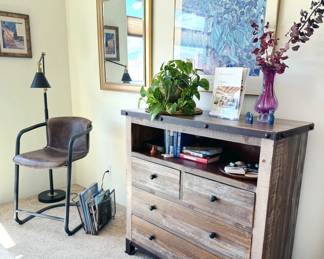 Tall dresser with 4 drawers, live plants, framed wall art, mirrors