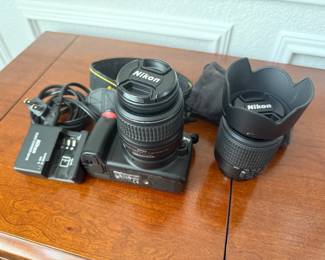 Nikon D40 with two lenses, charger and book