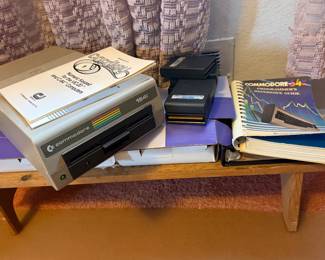 Commodore 64 with reference guide and games
