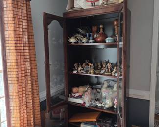 Antique toys, including Shirley Temple doll, and Hummel collectibles