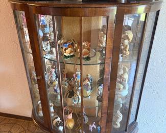 Demilune glass display cabinet