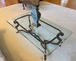Wrought iron and glass coffee table 