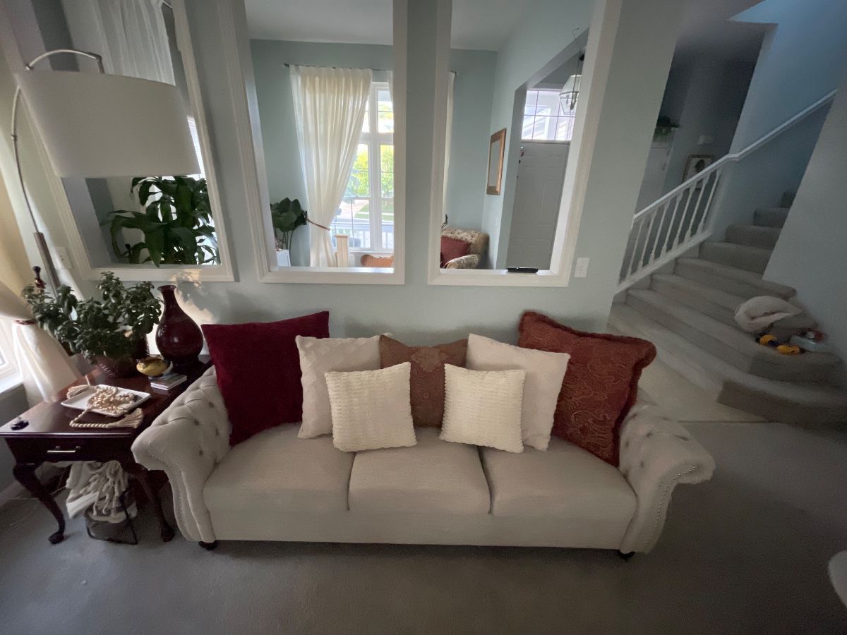 Matching Cream Tufted Sofas – $275 each or $500 for the pair. Elegant rolled-arm design with nailhead trim and coordinating accent pillows. Great condition