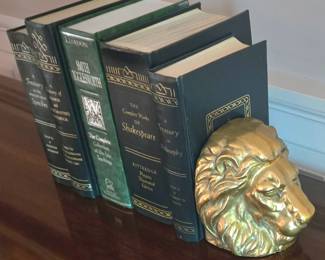 Vintage solid brass lion head bookends.