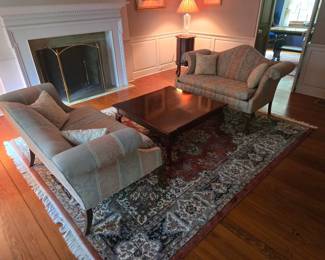 Queen Ann double love seats and solid wood table.