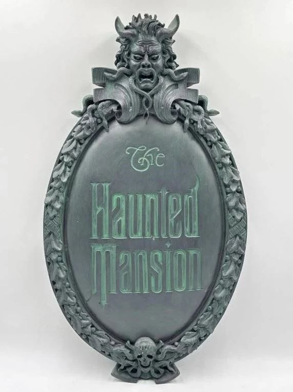 the haunted mansion sign