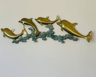 Brass dolphin wall art 
