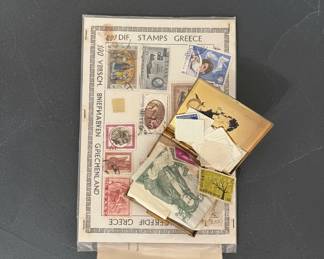 Collection of US State Quarters, Cent Collection Album, and Assorted Foreign Stamps