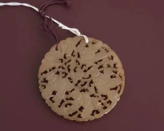 Carved Nephrite Jade Pendant with Floral and Foliage Motifs