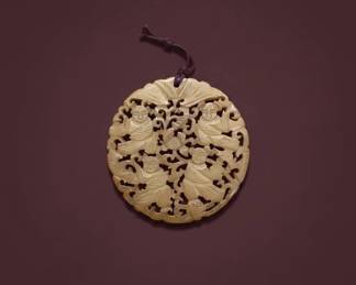 Carved Jade Pendant with Floral and Bird Motif second image