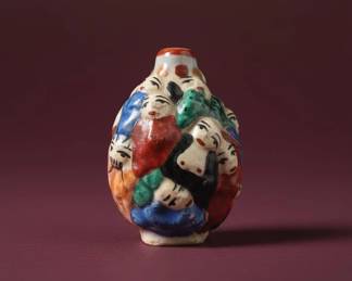 Chinese Famille Rose Molded Porcelain Snuff Bottle with Figures second image
