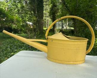 214 yellowpaintedmetalwateringcanwithl