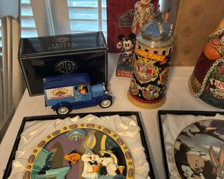 Looney Tunes collector's plates, Looney Tunes ERTL collectible car banks, Looney Tunes coat of arms stein