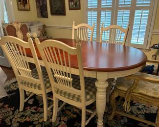 Two toned kitchen table with four chairs