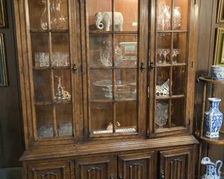 triple-door lighted china cabinet
