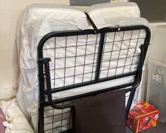 almost-new roll-away bed and mattress