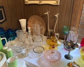 beautiful glassware, and a pair of giraffes
