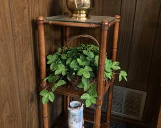 bamboo-style three-shelf display, brass vase, foliage, Asian vase
