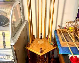 Pool cues and rack