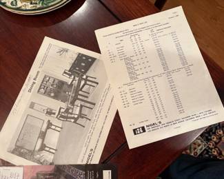 Brochure on dining room table financeab, chairs and sideboard. Solid Rosewood.