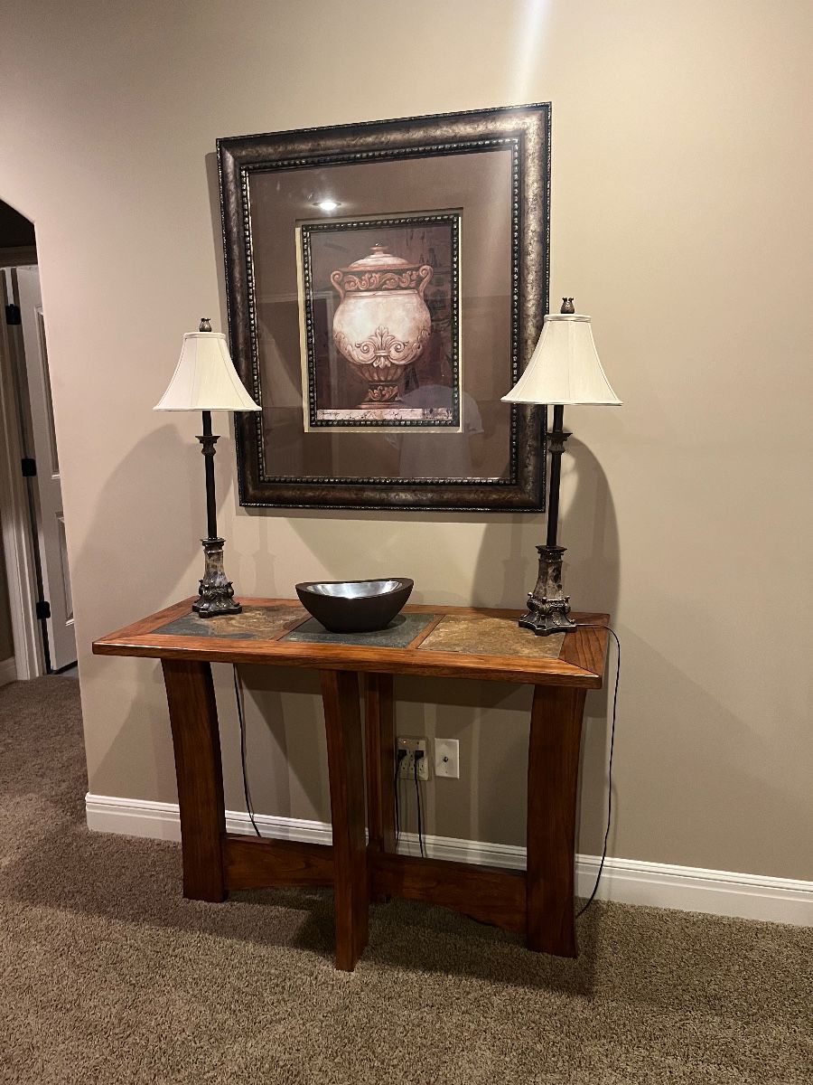 Beautiful sofa table , lamps and artwork