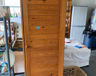 One of two wood cabinets