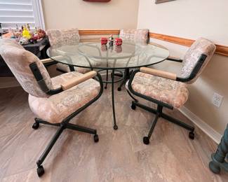 $350- Kitchen table w/4 chairs on casters