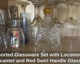 Assorted Glassware Set with Locomotive Decanter and Red Swirl Handle Glasses