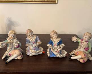 Vintage Meissen-Style showing the detailed littled legs in gentlemen and ladies sitting pose