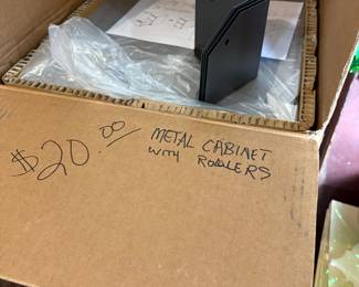 Metal Cabinet with rollers - still in box