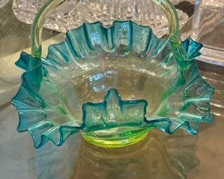 Vintage Fenton art glass basket in a green /teal color . Uranium base