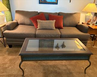Wonderful like new 3 cushion sofa with accent pillows. Metal and glass coffee table with matching end table and sofa table,-sold as a set or individually