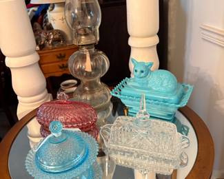 Vintage Style Kerosene Lamp, Vintage Westmoreland Blue milk glass cat covered dish lacey base and glass eyes, Vintage Fenton Art Glass Blue opalescent hobnail lidded dish, Clear glass vintage butter dish.