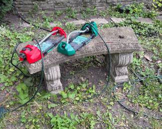 One of two cement benches