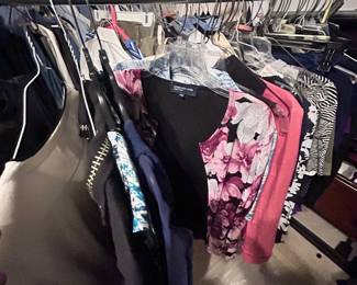 Wildflower Lane Estate Sales, Sugar Land's Estate Sale Experts, presents women's clothing, blouses, and matching sets.