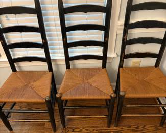 R39 - $150. Shaker style ladderback chairs. Distressed black. 3 side chairs 1 arm chair. All are very sturdy - backs show rubbing wear from sitting/table. Measures 17" wide x 13.75" deep x 42" tall. Floor to seat is 17.5".