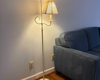 R41 - $40. Cream metal floor lamp. Measures 62.5" tall. Excellent Condition. Shade is good.