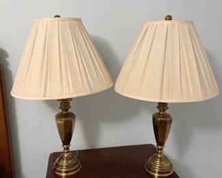 R16 - $50. Pair of Brass Table Lamps. Lamps are in very good condition - shades need replaced. Measures 30" tall.