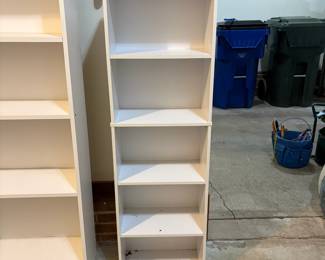 R46 - $15. Small White finished 5 shelf bookcase. Measures 15.5" wide x 9.25" deep x 52" tall. Shelves are NOT adjustable.