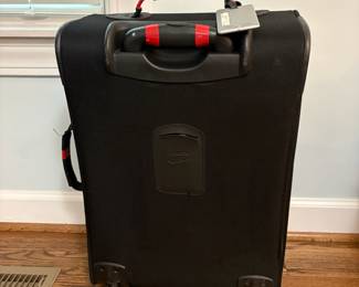 R14 - $10. American Tourister Carry On. Measures 14" x 9" x 22". 2 wheels - not spinners. In good used condition.
