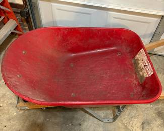 R49 - $40. Red Metal Wheelbarrow. Great condition.